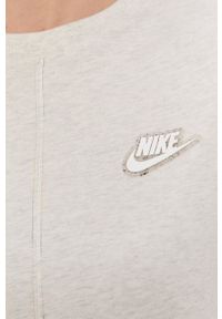 Nike Sportswear T-shirt damski kolor kremowy. Okazja: na co dzień. Kolor: beżowy. Materiał: bawełna, włókno. Wzór: aplikacja. Styl: sportowy, casual #2