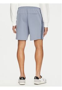 Calvin Klein Jeans Szorty sportowe J30J327246 Niebieski Relaxed Fit. Kolor: niebieski. Materiał: bawełna, syntetyk. Styl: sportowy #3