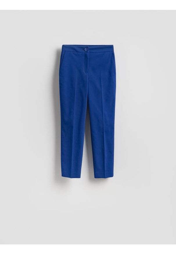 Reserved - Spodnie w kant z bawełną - niebieski. Kolor: niebieski. Materiał: bawełna