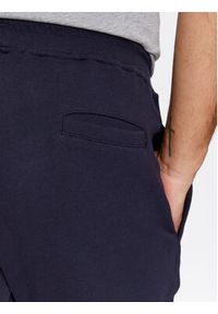 GANT - Gant Spodnie dresowe Reg Tonal Shield Pants 2039023 Granatowy Regular Fit. Kolor: niebieski. Materiał: bawełna #4