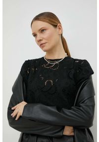 Herskind bluzka bawełniana damska kolor czarny gładka. Okazja: na co dzień. Kolor: czarny. Materiał: bawełna. Długość rękawa: krótki rękaw. Długość: krótkie. Wzór: gładki. Styl: casual #2