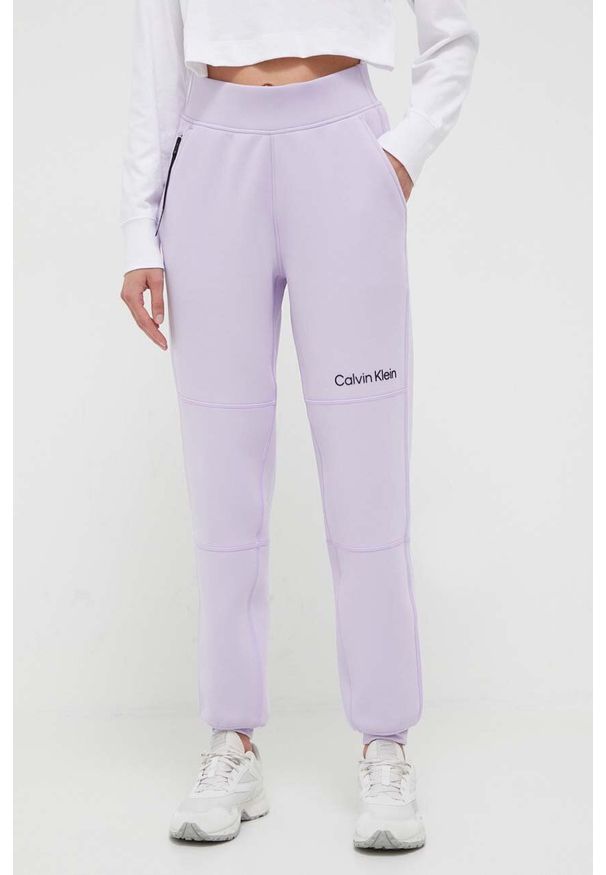 Calvin Klein Performance spodnie treningowe kolor fioletowy gładkie. Stan: podwyższony. Kolor: fioletowy. Wzór: gładki