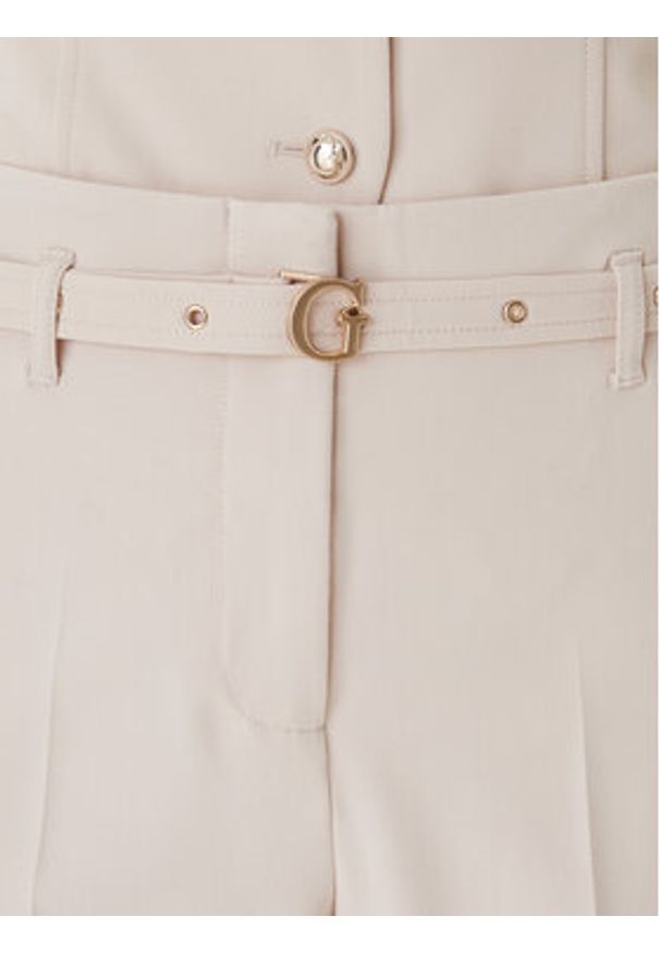 Guess Spodnie materiałowe W6GB17 W1894 Beżowy Regular Fit. Kolor: beżowy. Materiał: syntetyk