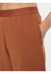 Calvin Klein Underwear Spodnie piżamowe 000QS7004E Brązowy Regular Fit. Kolor: brązowy. Materiał: bawełna #3