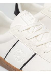 Big-Star - Sneakersy męskie z czarnymi akcentami białe TT174128 101. Nosek buta: okrągły. Kolor: biały. Materiał: guma, syntetyk, materiał. Wzór: aplikacja #4
