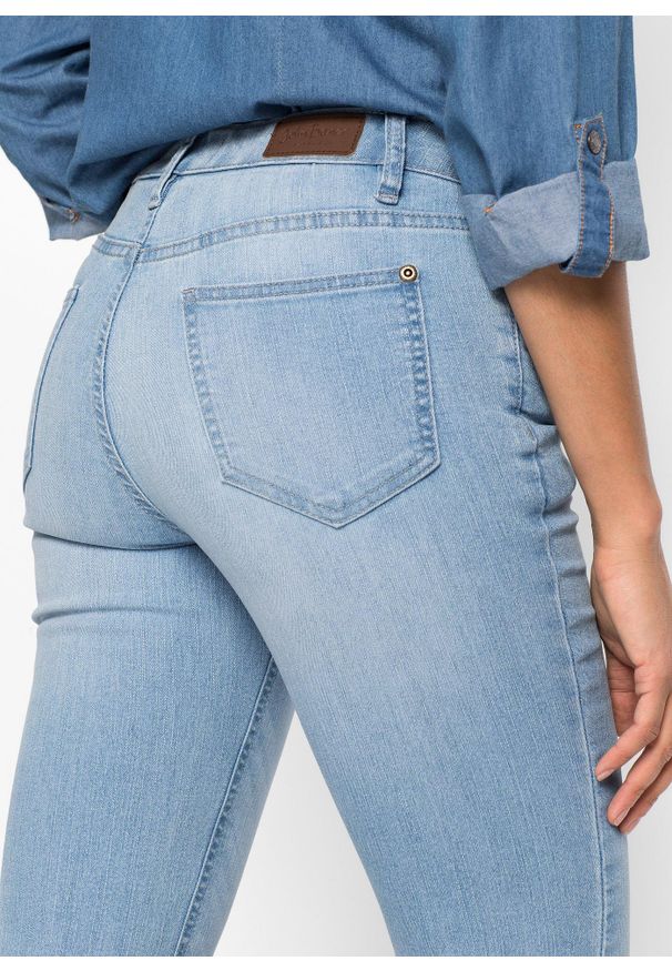 bonprix - Wygodne dżinsy ze stretchem o kroju bootcut, mid waist. Kolor: niebieski