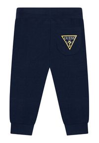 Guess Spodnie dresowe N93Q17 KAUG0 Granatowy Regular Fit. Kolor: niebieski. Materiał: bawełna