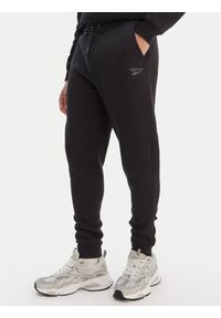 Reebok Spodnie dresowe Azaz RK25549CCM Czarny Slim Fit. Kolor: czarny. Materiał: syntetyk #1