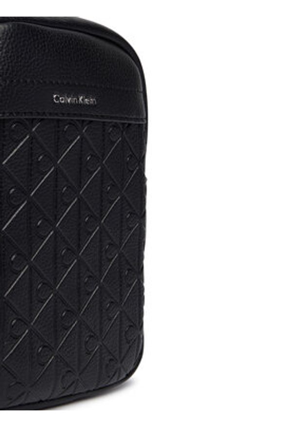 Calvin Klein Saszetka Emblem Aop Emboss Slim Reporter LV04D3228G Czarny. Kolor: czarny. Materiał: skóra