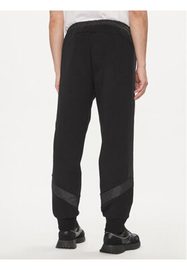 BOSS - Boss Spodnie dresowe Hadikon 50504888 Czarny Relaxed Fit. Kolor: czarny. Materiał: bawełna