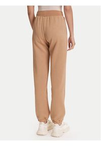 Guess Spodnie dresowe V5YB06 KBSL2 Beżowy Regular Fit. Kolor: beżowy. Materiał: syntetyk