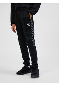 Hummel spodnie dziecięce sportowe dresowe Authentic Training Pants. Kolor: czarny. Materiał: dresówka. Sport: joga i pilates