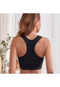 Intica - Biustonosz sportowy z piankowym wzmocnieniem do treningu Zwantje. Kolor: czarny. Materiał: materiał #2