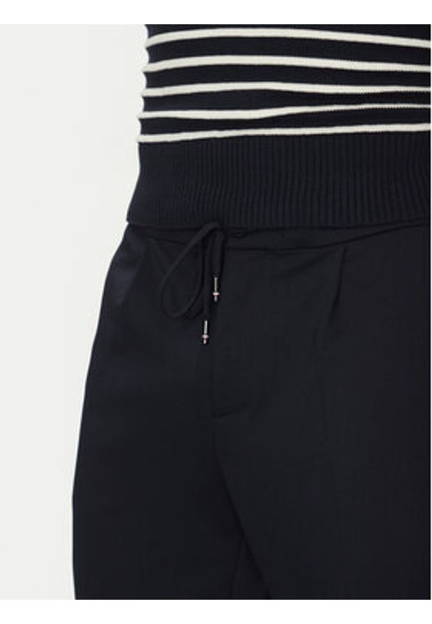 TOMMY HILFIGER - Tommy Hilfiger Spodnie materiałowe Punto MW0MW39197 Granatowy Regular Fit. Kolor: niebieski. Materiał: syntetyk