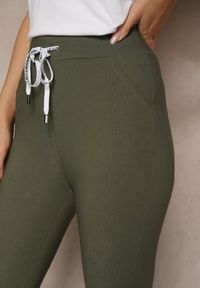 Renee - Ciemnozielone Spodnie z Bawełną i Sznurowaniem Purrena. Okazja: na co dzień. Kolor: zielony. Materiał: bawełna. Styl: elegancki, casual