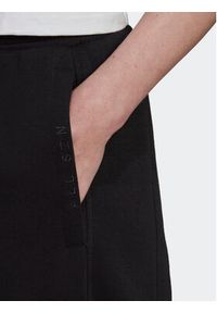 Adidas - adidas Spodnie dresowe All Szn HK0439 Czarny Relaxed Fit. Kolor: czarny. Materiał: bawełna #5