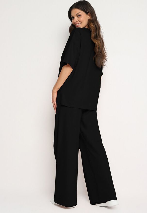 Born2be - Czarny Bawełniany Komplet Bluzka z Rozcięciami po Bokach Szerokie Spodnie z Gumką w Pasie Undrea. Kolor: czarny. Materiał: bawełna