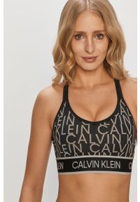 Calvin Klein Performance - Biustonosz sportowy. Kolor: czarny. Materiał: poliester, materiał, elastan #2