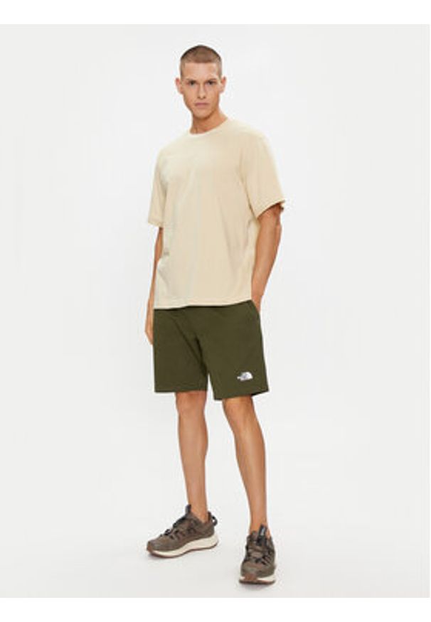 The North Face Szorty sportowe Graphic NF0A3S4F Zielony Regular Fit. Kolor: zielony. Materiał: bawełna. Styl: sportowy