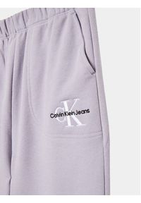 Calvin Klein Jeans Spodnie dresowe Monogram IG0IG02094 Fioletowy Regular Fit. Kolor: fioletowy. Materiał: bawełna #2