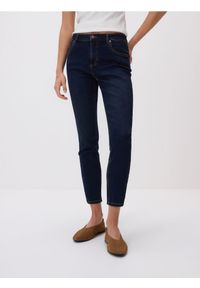 Reserved - Jeansy slim - granatowy. Kolor: niebieski
