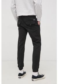 Tommy Jeans Spodnie męskie kolor czarny joggery. Kolor: czarny. Materiał: bawełna