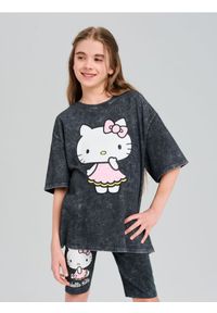 Sinsay - Krótkie legginsy Hello Kitty - czarny. Kolor: czarny. Długość: krótkie. Wzór: motyw z bajki