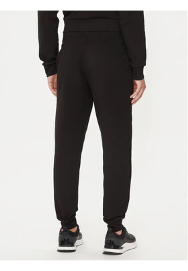 Calvin Klein Spodnie dresowe Shadow Embosed Logo K10K113097 Czarny Regular Fit. Kolor: czarny. Materiał: bawełna