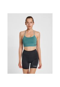 Damski bezszwowy biustonosz sportowy Hummel Tiffy. Kolor: niebieski, zielony, wielokolorowy. Sport: fitness