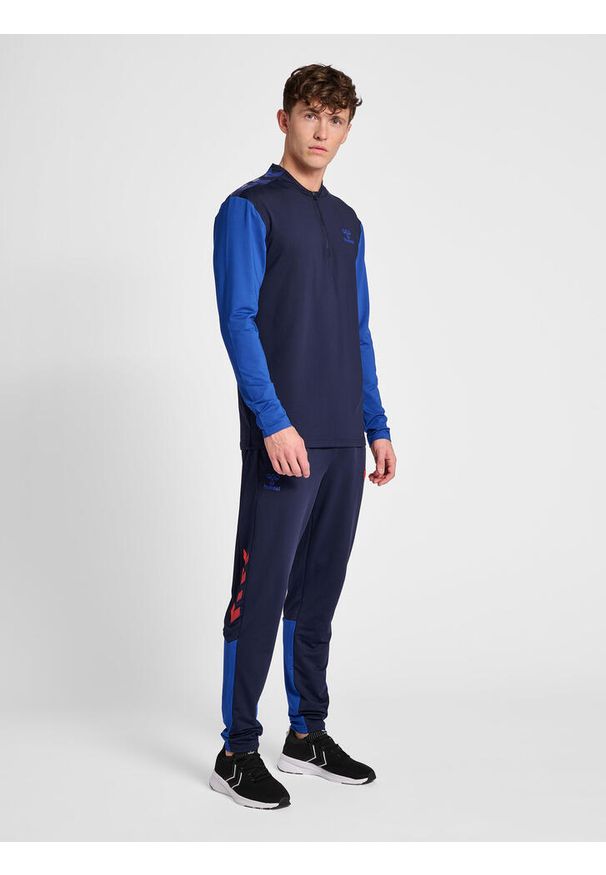Bluza dresowa 1/2 zip Hummel Pro Grid. Kolor: niebieski. Materiał: dresówka. Sport: piłka ręczna