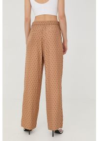 Bruuns Bazaar spodnie damskie kolor beżowy szerokie high waist. Stan: podwyższony. Kolor: beżowy. Materiał: tkanina #4
