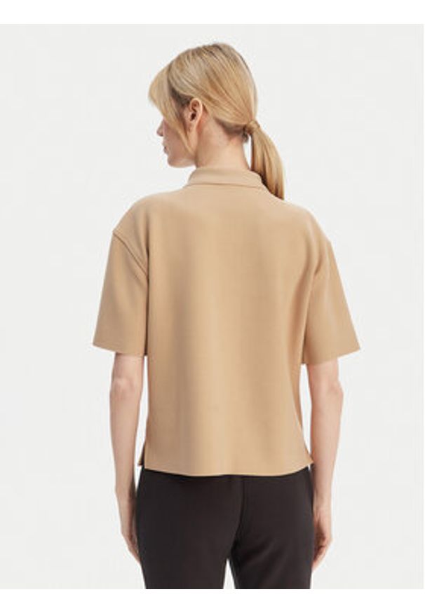 Calvin Klein Polo LV044E241G Beżowy Relaxed Fit. Typ kołnierza: polo. Kolor: beżowy. Materiał: syntetyk