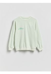 Reserved - Bluza oversize z efektem sprania - jasnoturkusowy. Kolor: turkusowy. Materiał: dzianina, bawełna