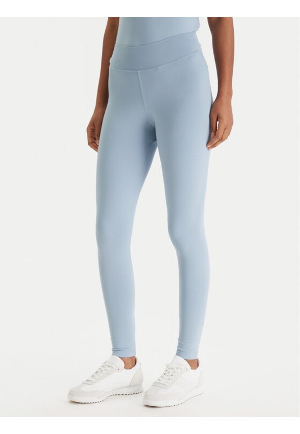 Guess Legginsy V6RB11 KD952 Niebieski Slim Fit. Kolor: niebieski. Materiał: syntetyk
