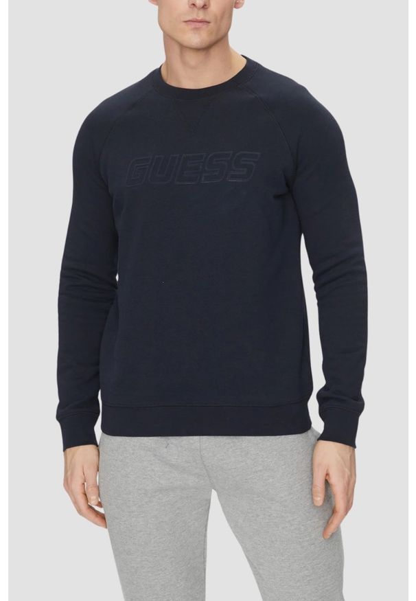 Guess - GUESS Granatowa męska bluza New Aldwin. Kolor: niebieski. Materiał: bawełna, poliester, materiał. Wzór: bez wzorów