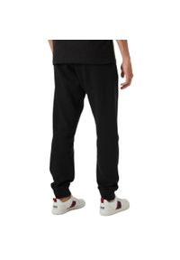 Spodnie sportowe męskie Helly Hansen Core. Kolor: czarny. Materiał: dresówka