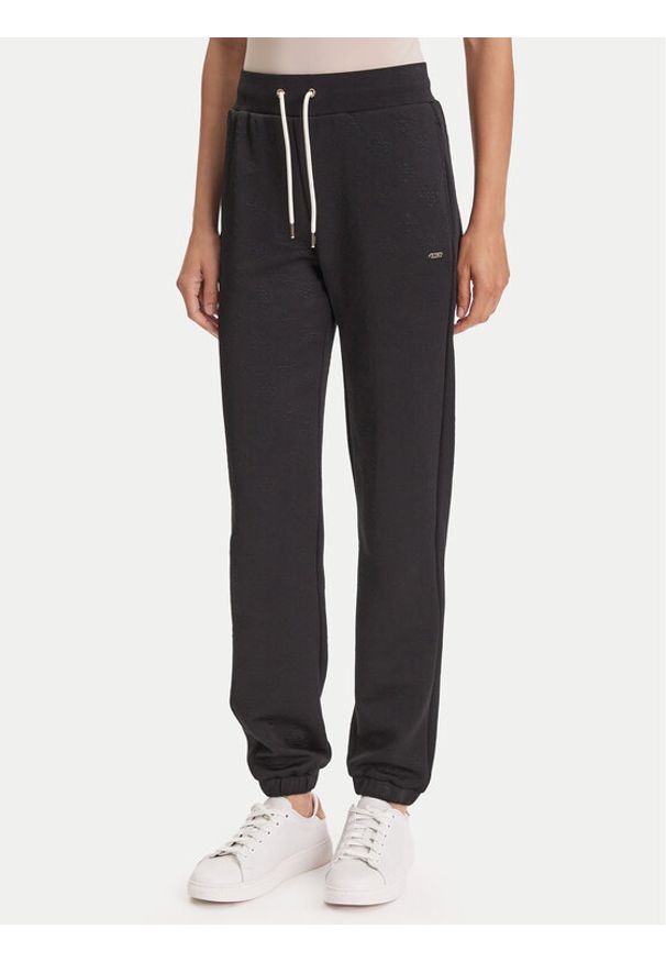 Guess Spodnie dresowe V5YB06 KBSL2 Czarny Regular Fit. Kolor: czarny. Materiał: syntetyk