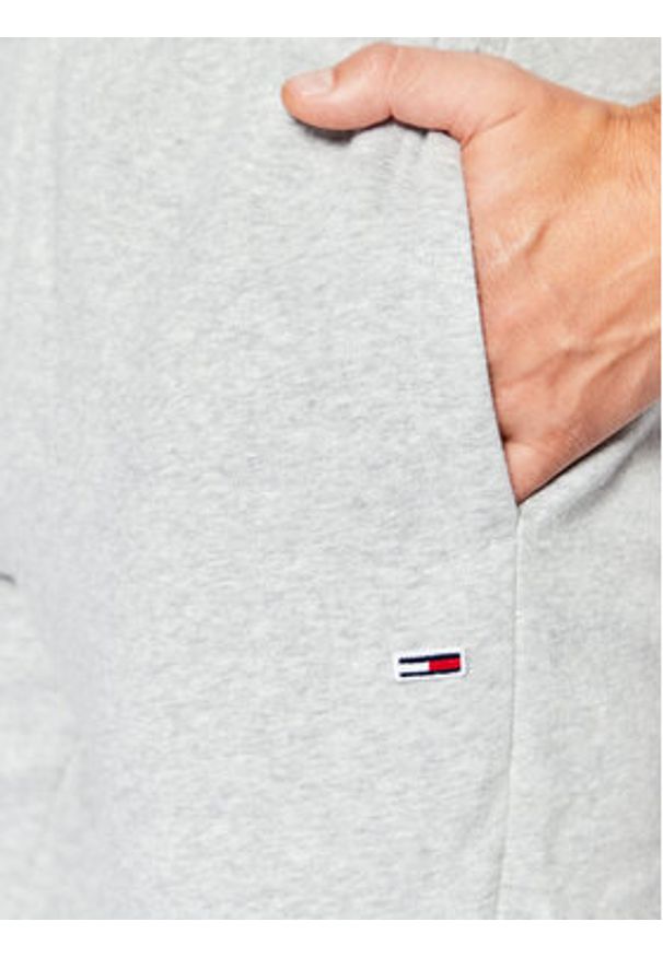 Tommy Jeans Spodnie dresowe DM0DM15380 Szary Slim Fit. Kolor: szary. Materiał: bawełna, syntetyk