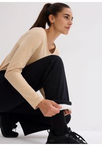 bonprix - Spodnie sportowe ocieplane, na miękkiej podszewce z polaru, szeroki fason. Kolor: czarny. Materiał: polar. Styl: sportowy #2