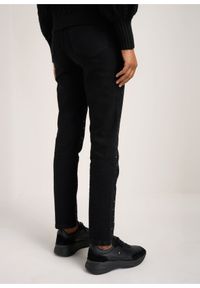 Ochnik - Czarne jeansy z kryształkami damskie. Kolor: czarny. Materiał: bawełna. Wzór: aplikacja. Sezon: zima, lato