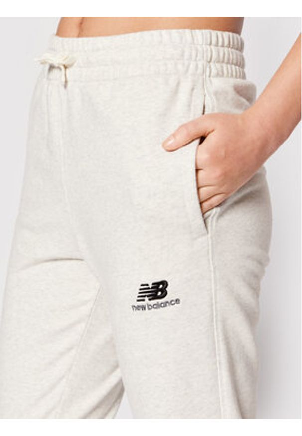 New Balance Spodnie dresowe Unisex UP21500 Szary Ahletic Fit. Kolor: szary. Materiał: bawełna