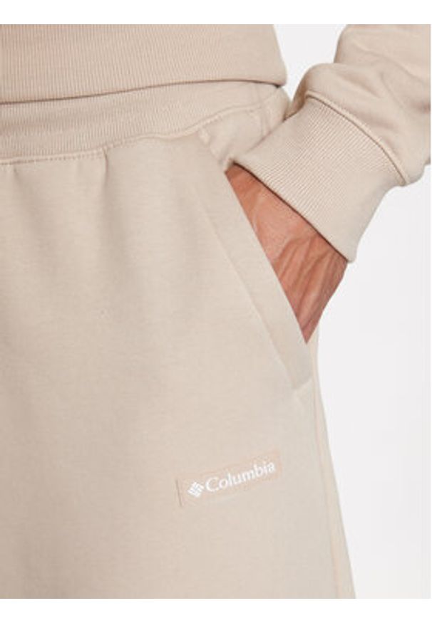 columbia - Columbia Spodnie dresowe Marble Canyon™ Heavyweight Fleece Pant Brązowy Regular Fit. Kolor: beżowy, brązowy. Materiał: bawełna, syntetyk