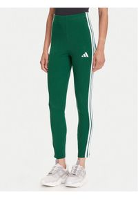 Adidas - adidas Legginsy Essentials 3-Stripes KB7663 Zielony Slim Fit. Kolor: zielony. Materiał: bawełna