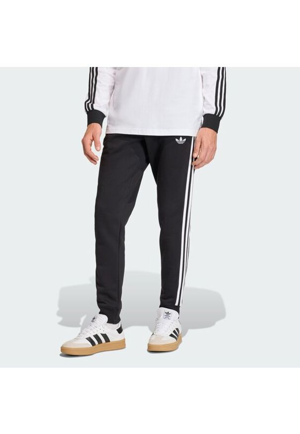 Adidas - adidas Spodnie dresowe 3-Stripes KE3562 Czarny Slim Fit. Kolor: czarny. Materiał: bawełna
