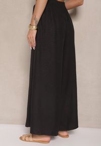 Renee - Czarne Szerokie Spodnie High Waist Ozdobione Wiązaniem Telonia. Okazja: na co dzień. Stan: podwyższony. Kolor: czarny. Wzór: aplikacja. Styl: casual, elegancki
