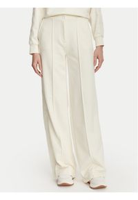 Guess Spodnie materiałowe V6YB26 K5139 Kremowy Relaxed Fit. Kolor: kremowy. Materiał: bawełna #1