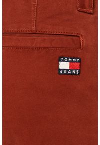 Tommy Jeans - Spodnie DM0DM06518. Kolor: czerwony. Materiał: tkanina, bawełna, elastan. Wzór: gładki #3