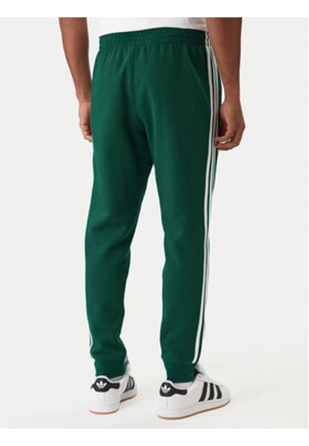 Adidas - adidas Spodnie dresowe 3-Stripes KE3559 Zielony Slim Fit. Kolor: zielony. Materiał: bawełna