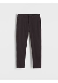 Reserved - Spodnie slim fit - fioletowy. Kolor: fioletowy. Materiał: tkanina, bawełna. Wzór: gładki