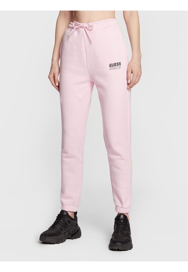 Guess Spodnie dresowe V2BB18 K9V34 Różowy Regular Fit. Kolor: różowy. Materiał: bawełna, dresówka